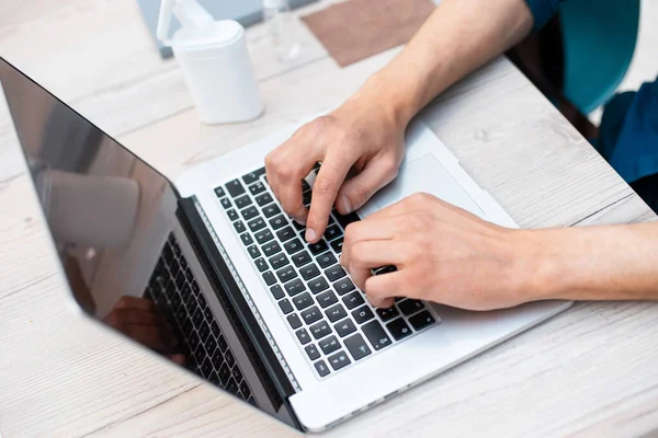 Close up. modern man using a laptop. — Stock Photo, Image