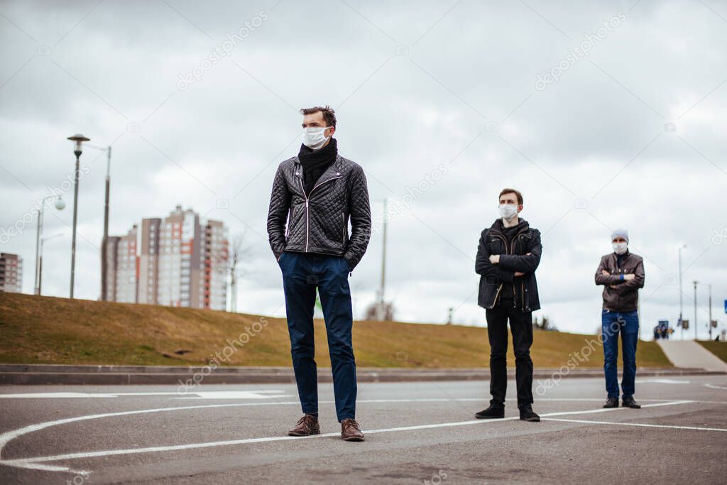 group of people standing in line at a safe distance