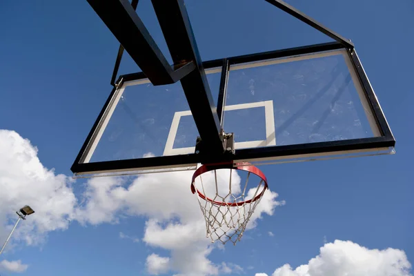 Basketball backboard on blue sky background — Stock Photo, Image