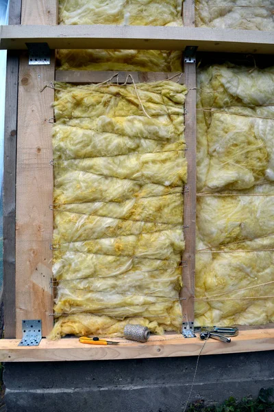 Wall with insulation material rockwool and tools — Stock Photo, Image