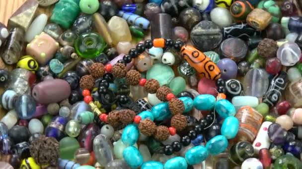 Rotating Colorful Various Indian Old New Beads Bracelet Background — Stock Video