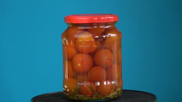 Rotating Pickled Glass Pot Jar Red Tomato — Stock Video