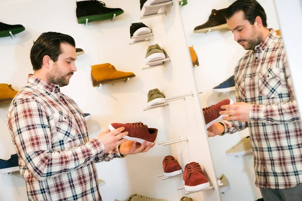 Adult Man Shopping For Shoes