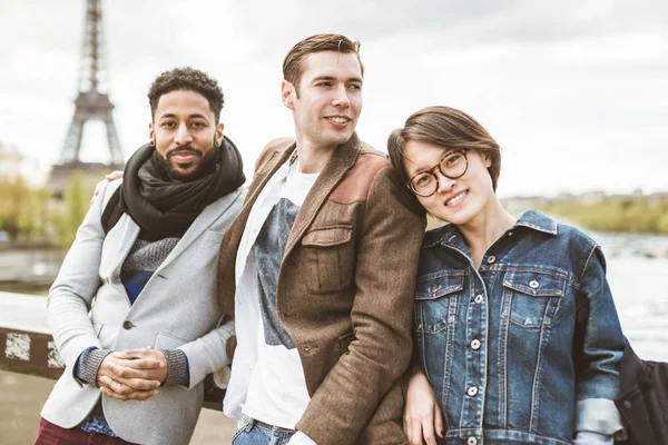 Multi-ethnic Group Of Friends Having Fun In Paris Along Seine