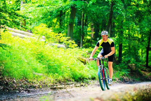 Young Man Riding His Mountain Bike