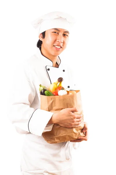 Cook Holding Groceries — Stock Photo, Image