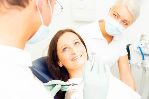 Young Woman Getting A Treatment At The Dentist — Stock Photo, Image