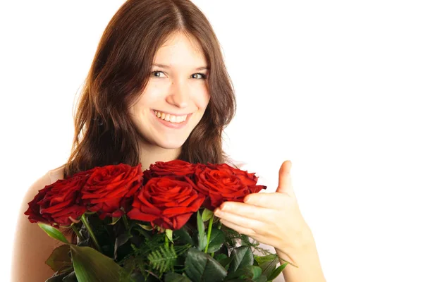 Νεαρή γυναίκα με τριαντάφυλλα — Φωτογραφία Αρχείου