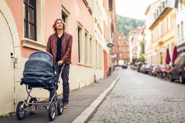 Young Father With Baby Stroller In The City — Stock Photo, Image