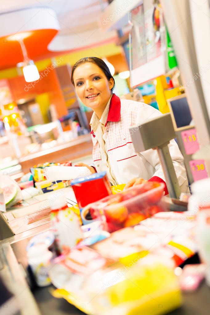 Sales Clerk In The Supermarket