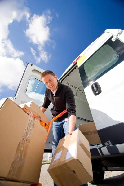 Delivery Boy With Van Stock Image