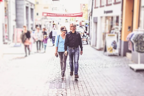 Senior Couple Walking Through The Streets of Tuebingen — стоковое фото