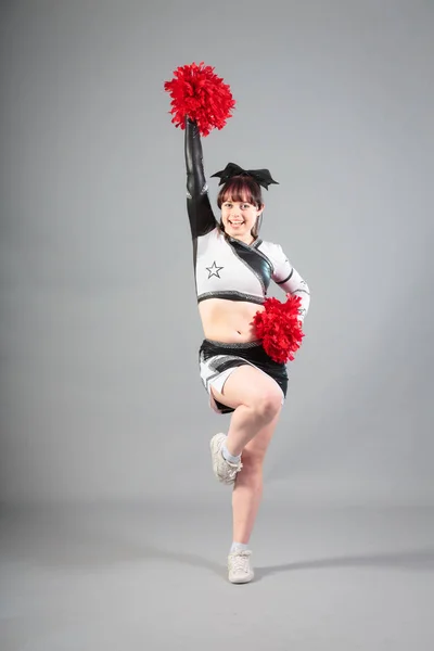 Studio Shot Of Cheerleader Posing — kuvapankkivalokuva