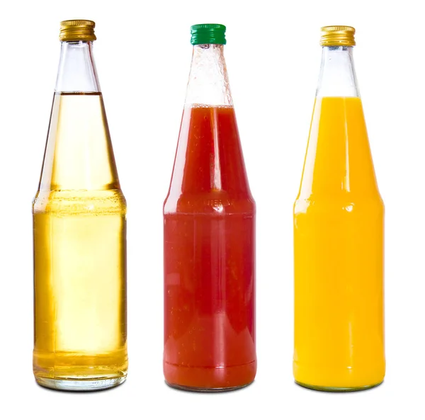 Drei Saftflaschen, Apfel, Tomate, Orange — Stockfoto