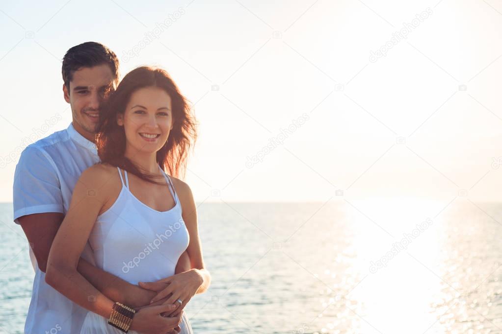 Young Couple By The Sea
