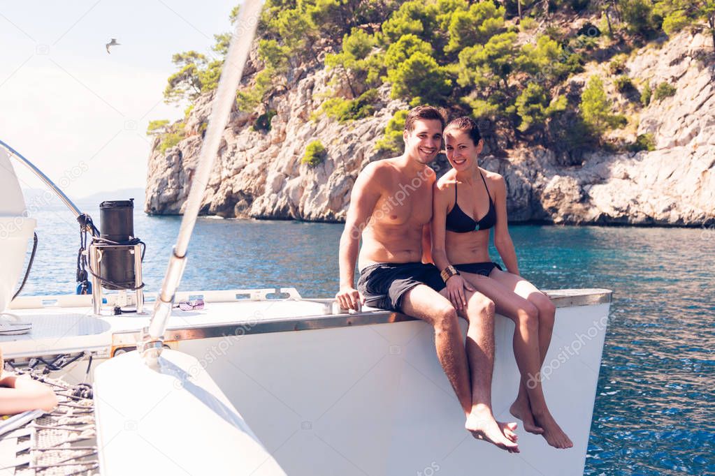 Young Couple On Catamaran