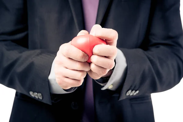 Hombre de negocios apretando la bola de estrés — Foto de Stock