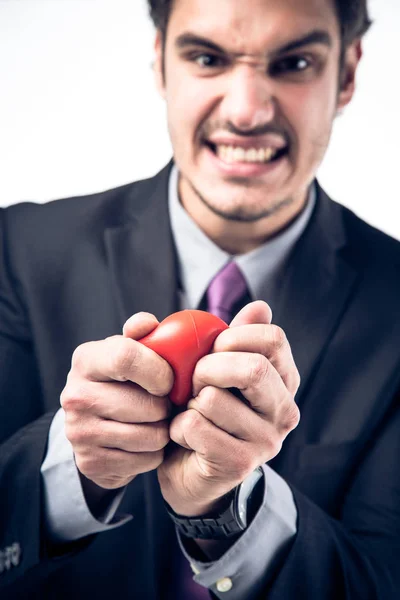 Businessman Squeezing Stress Ball — Stock Photo, Image