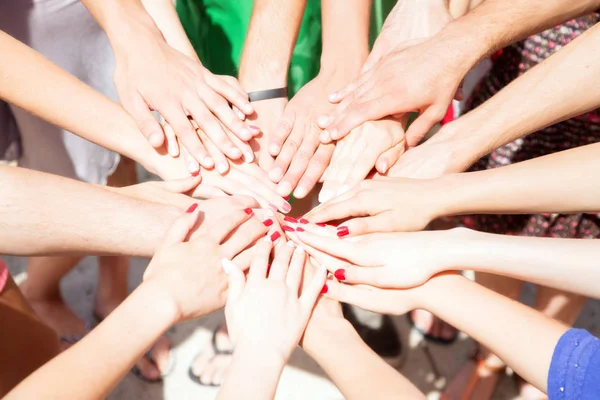 Large Group Of Young People Putting Their Hands Together — Stock Photo, Image