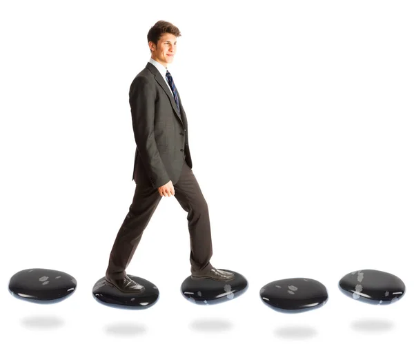 Businessman On Stepping Stones — Stock Photo, Image