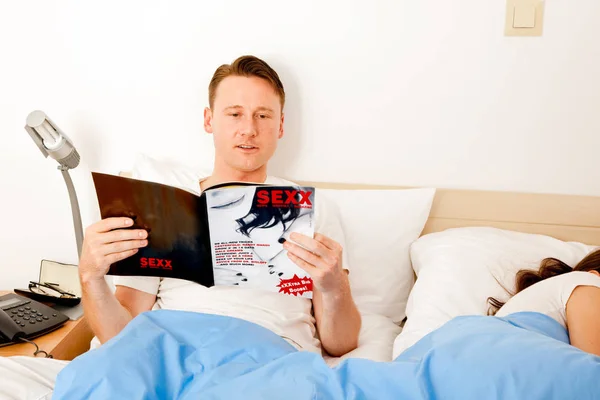 Enjoying A Porn Magazine — Stock Photo, Image