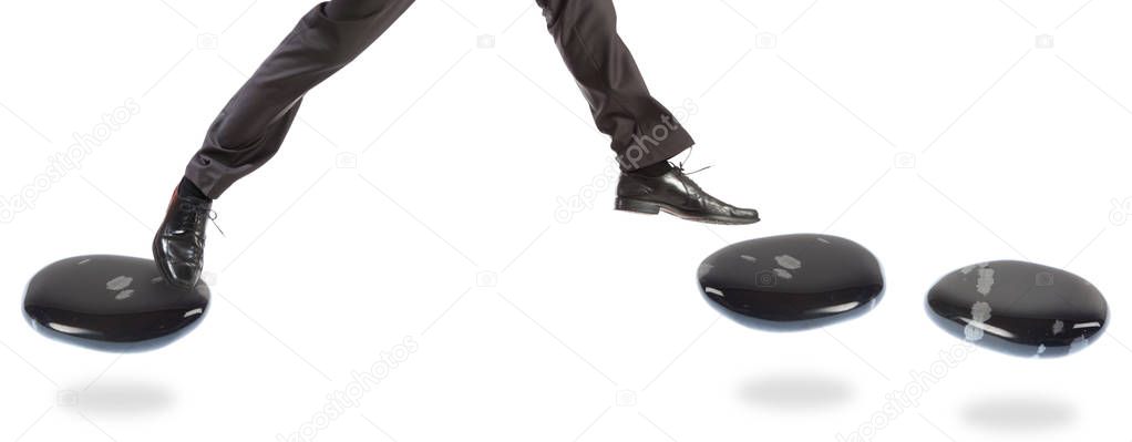 Businessman On Stepping Stones
