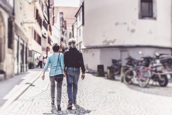 Senior Couple Walking Through The Streets of Tuebingen — стоковое фото