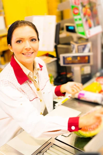 Sales Clerk In The Supermarket