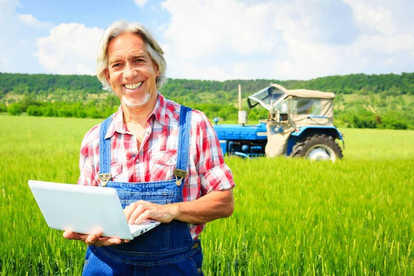 Farmer Standing In A Field — Stock Photo, Image