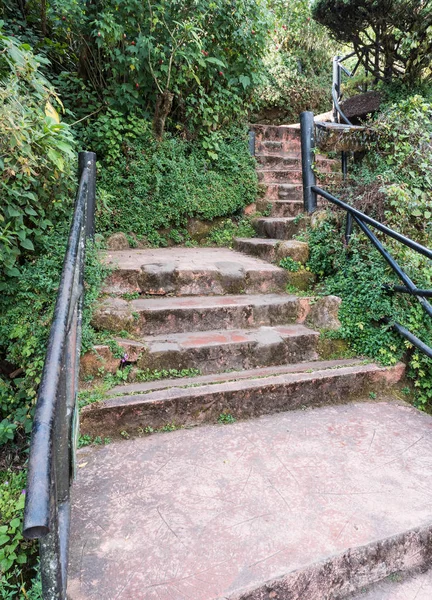 Stone staircase with the metal rail. — Stock Photo, Image