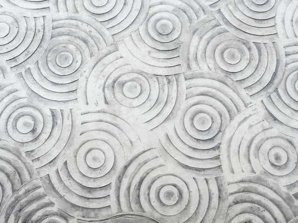 Circle graphic pattern on the concrete floor.