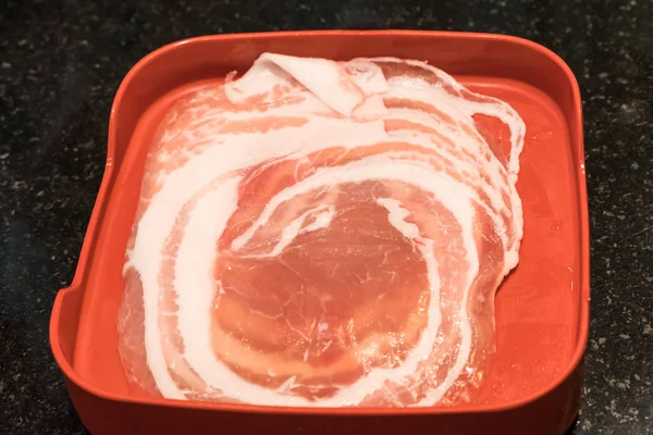Kurobuta sliced pork in the red tray. — Stock Photo, Image