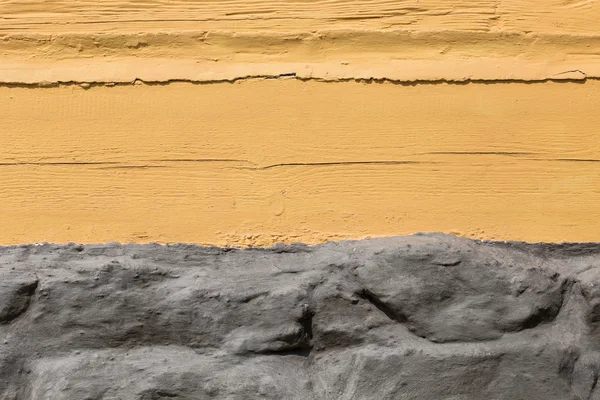 The structure of the plaster in yellow and gray — Stock Photo, Image