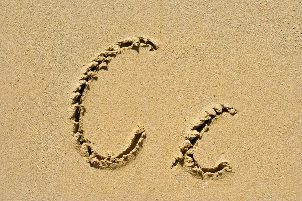 Golden sand letter — Stock Photo, Image