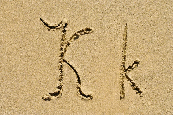 Golden sand letter — Stock Photo, Image