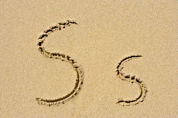 Golden sand letter — Stock Photo, Image