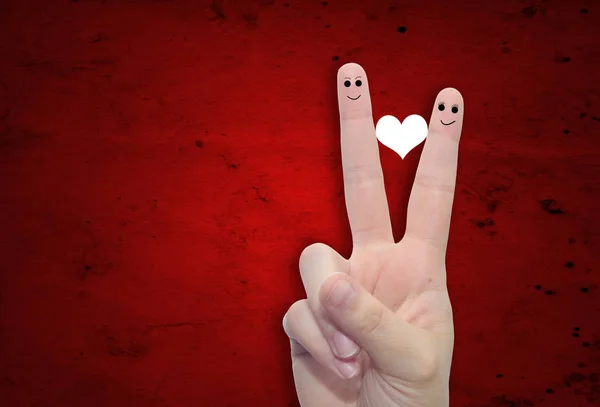 Dedos y un corazón pintado — Foto de Stock