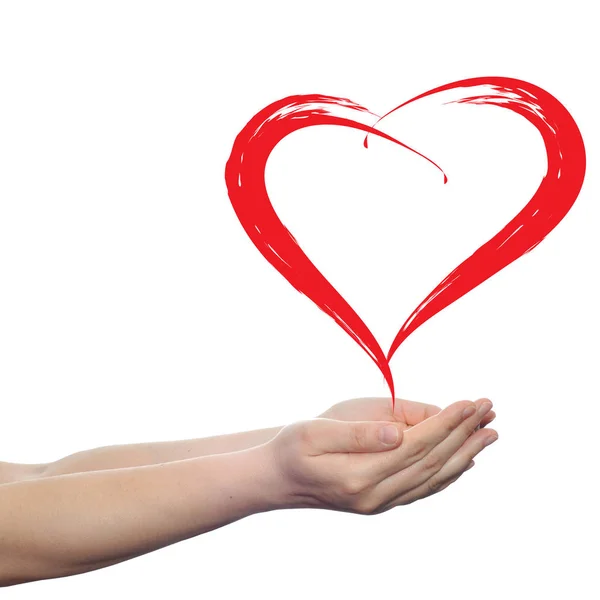 Painted red heart in hands — Stock Photo, Image