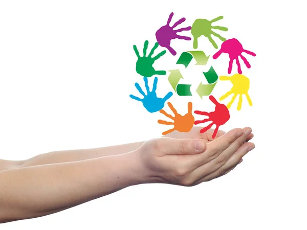 Hand prints and green recycle symbol — Stock Photo, Image