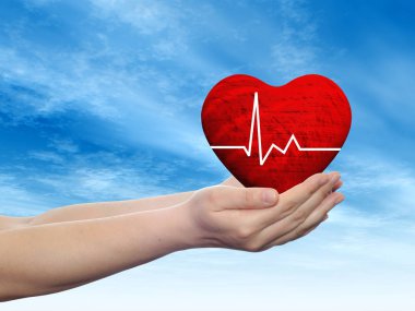 Kırmızı kalp işareti elinde