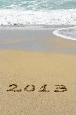 Sahil kumu üzerinde metin