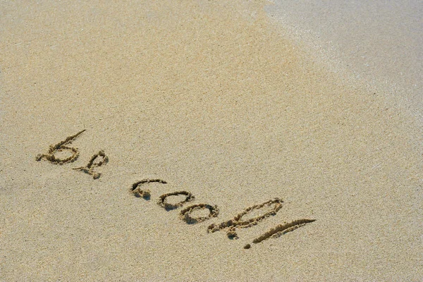 Text na pláži písek — Stock fotografie