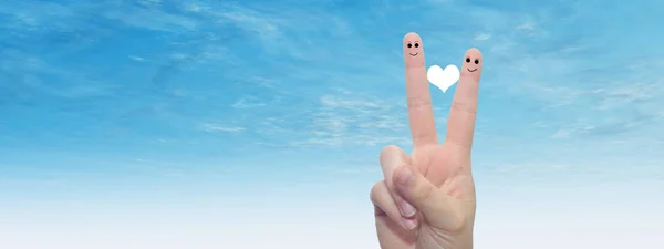 Two fingers with red heart — Stock Photo, Image