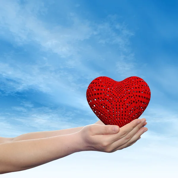 Heart symbol in human hands — Stock Photo, Image