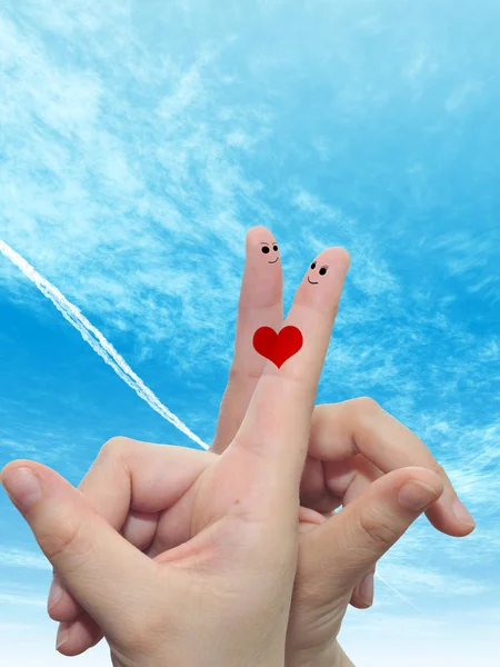 Two fingers with red heart — Stock Photo, Image