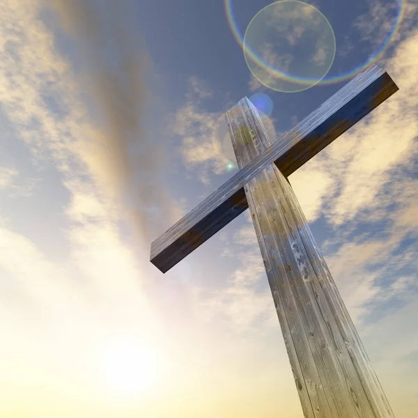 Chrześcijańskiej krzyż stojący na skale — Zdjęcie stockowe
