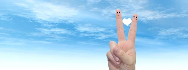 Fingers with heart and faces — Stock Photo, Image