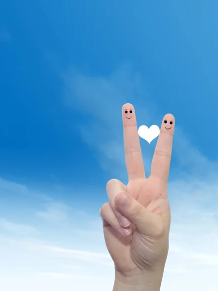 Hand with white heart and smiley faces — Stock Photo, Image