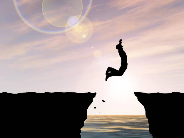 Mansilhouette springen van cliff — Stockfoto