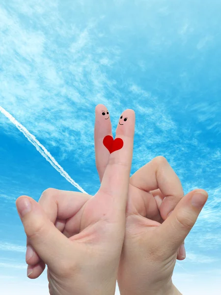 Fingers with red heart and smiley faces — Stock Photo, Image